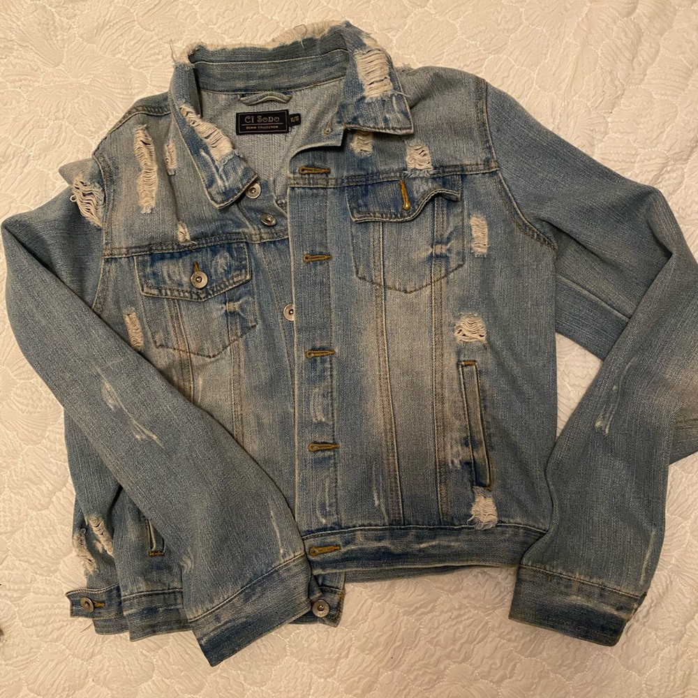 Distressed jean jacket
